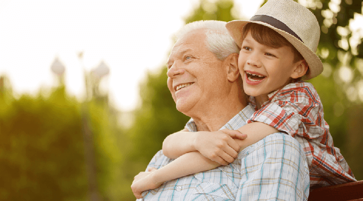 Man Enjoying Retirement With Grandchild